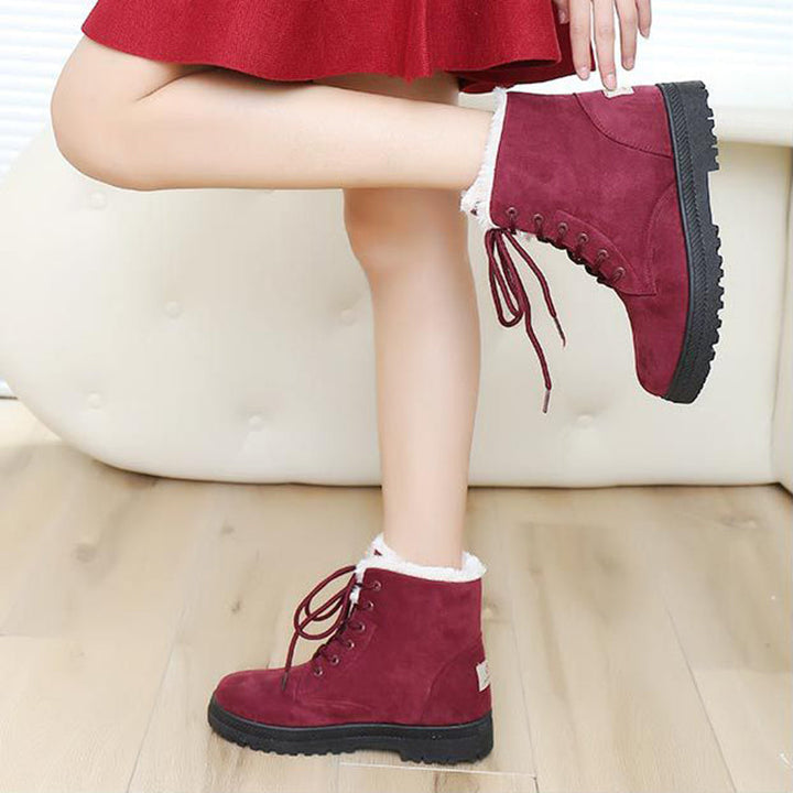Hoge snowboots voor dames met veters en warme wolvoering