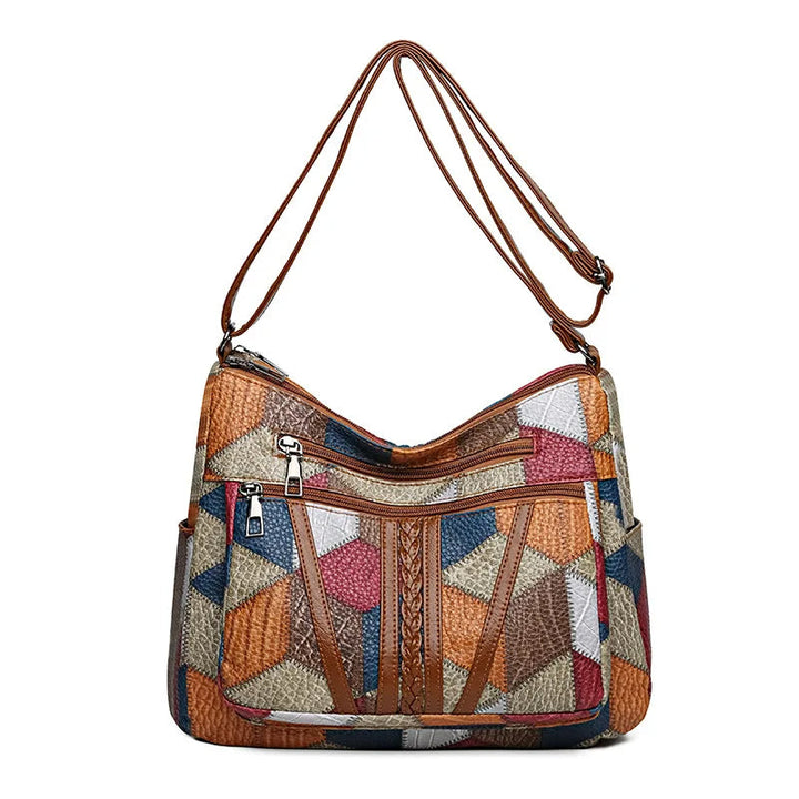 Patchwork-tas voor elke dag met inzetstukken van kunstleer.