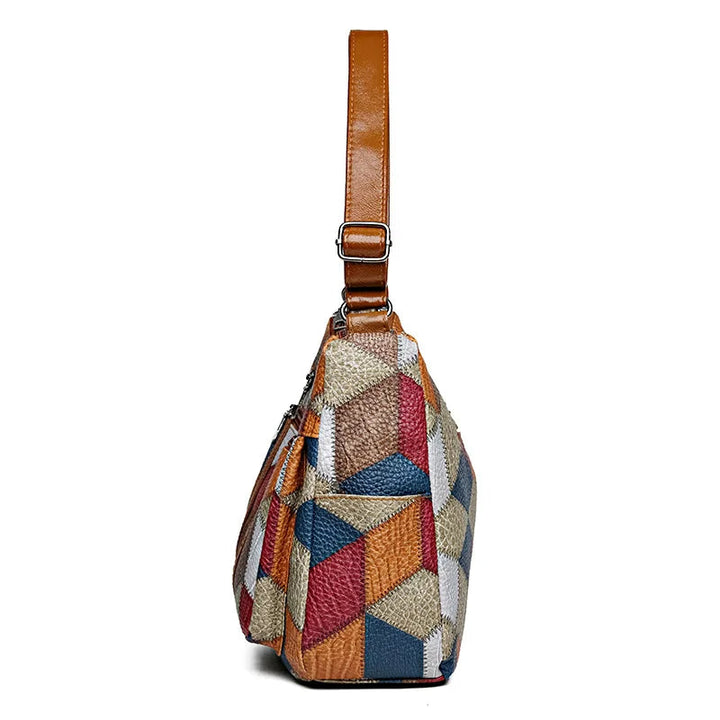 Patchwork-tas voor elke dag met inzetstukken van kunstleer.