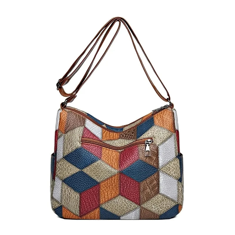 Patchwork-tas voor elke dag met inzetstukken van kunstleer.