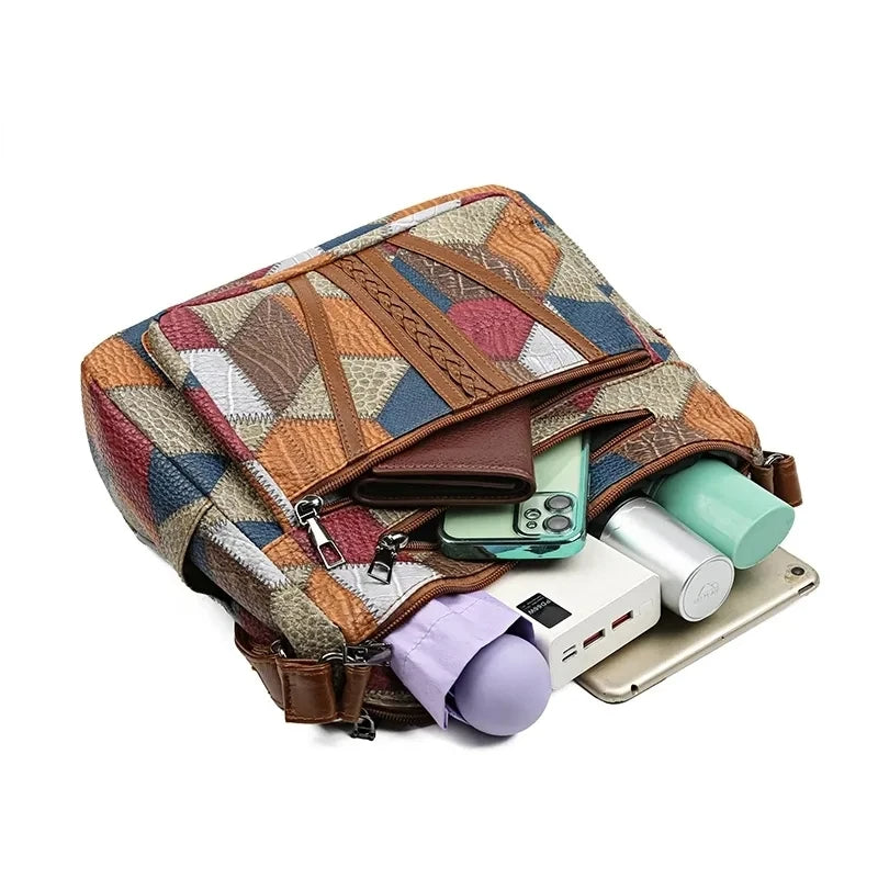 Patchwork-tas voor elke dag met inzetstukken van kunstleer.