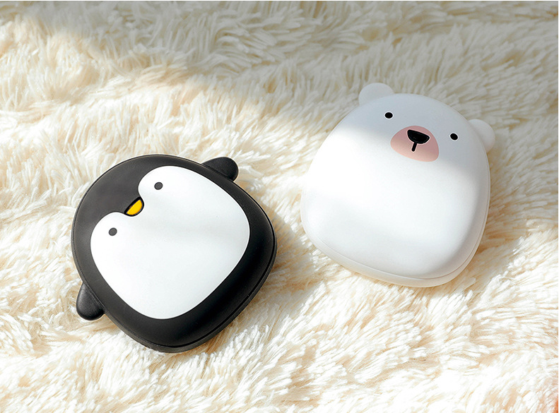 Schattige handwarmer pinguïn of ijsbeer, oplaadbaar via USB