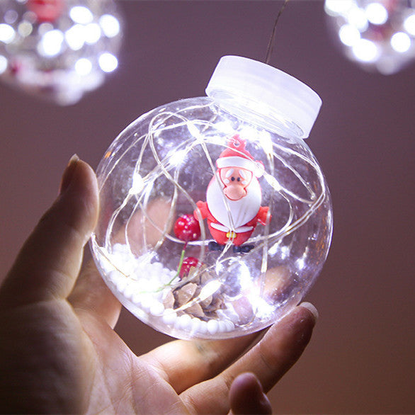 Lichtgordijn met kerstballen en kerstfiguren