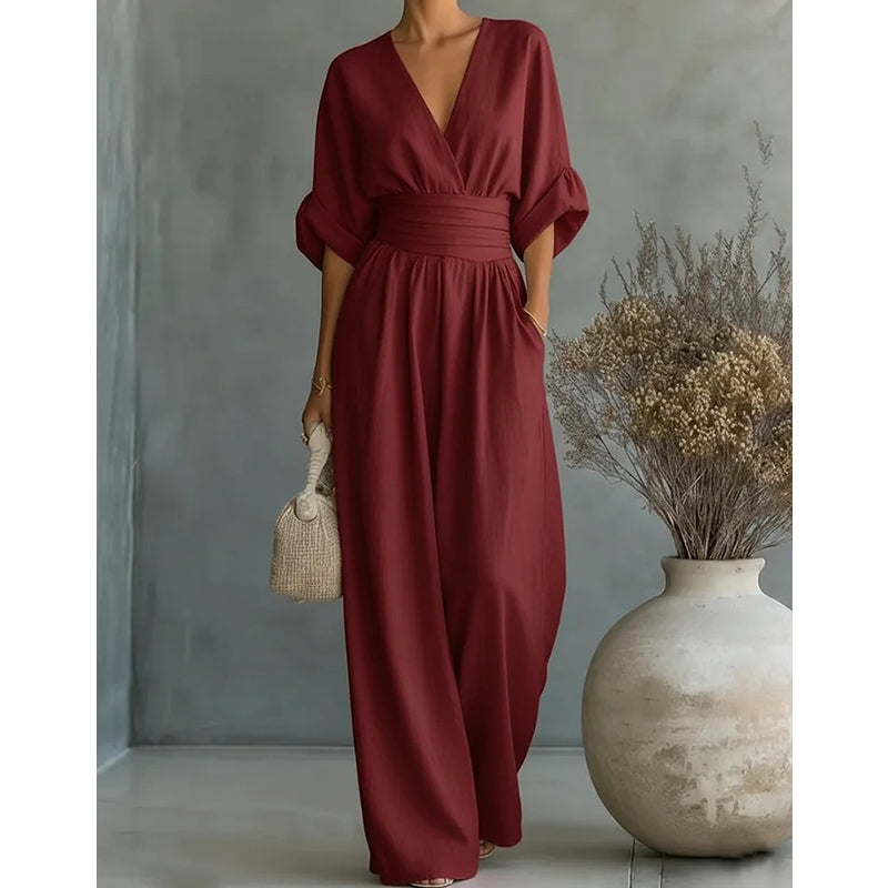 Elegante damesjumpsuit met V-hals en wijd uitlopende pijpen met hoge taille