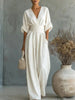 Elegante damesjumpsuit met wijde pijpen, V-hals en vloeiende pasvorm