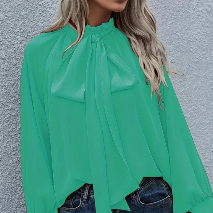 Chiffon blouse met strik en pofmouwen