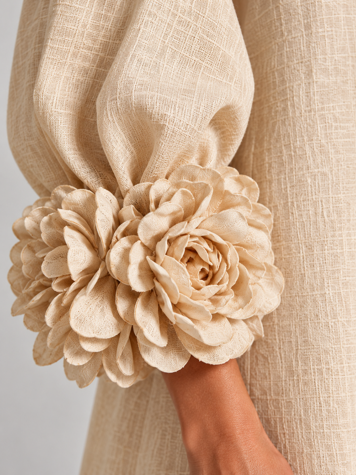 Elegante, lange, vloeiende jurk met ballonmouwen