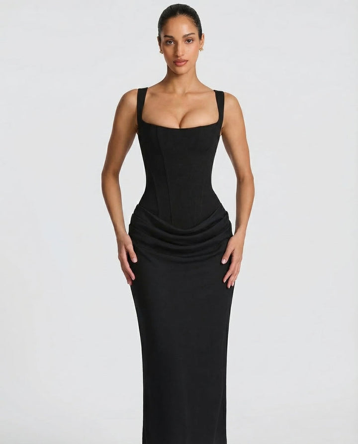 Corset-maxi-jurk met gedrapeerde rok en vetersluiting op de rug.