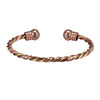 Gedraaide koperen armband met magnetische therapie