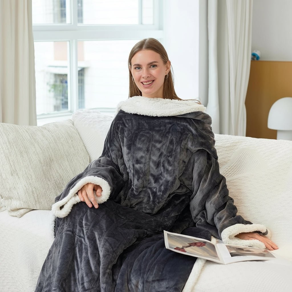 Verwarmde deken met mouwen en voetenzak van sherpa fleece