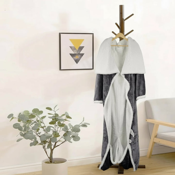 Verwarmde deken met mouwen en voetenzak van sherpa fleece