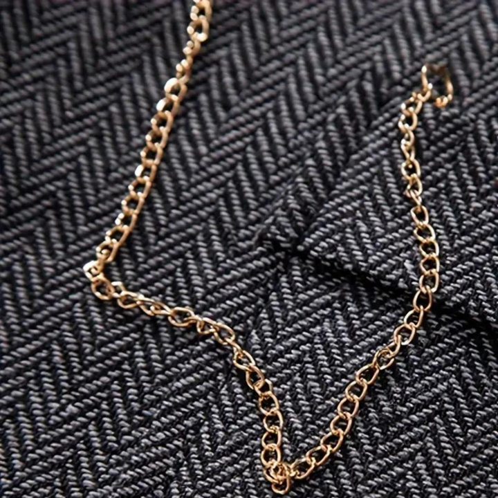 https://cdn.shopify.com/s/files/1/0659/5451/2986/files/heren-vintage-vest-in-visgraat-tweed-klassieke-stijl-met-elegante-revers-perfect-voor-elke-gelegenhe-8.png?v=1753546076