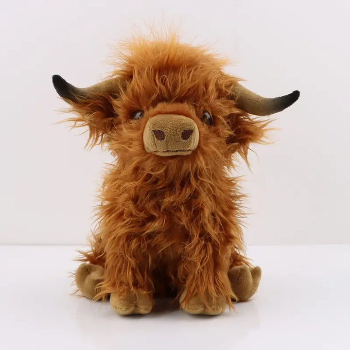 Highland-koe knuffel van pluche met ruige vacht en geborduurde details