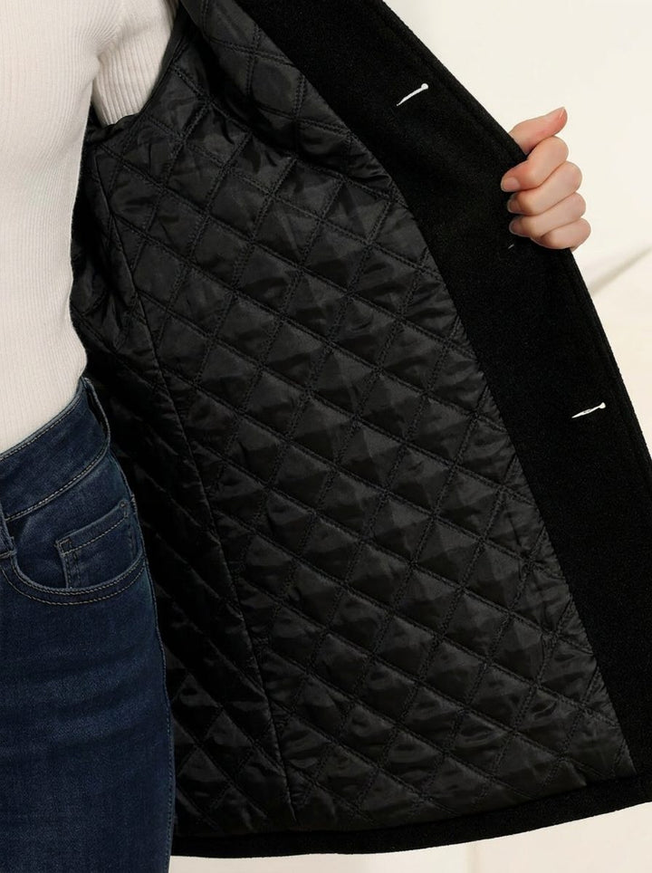 Lange trenchcoat met enkele knoopsluiting en kraag voor dames