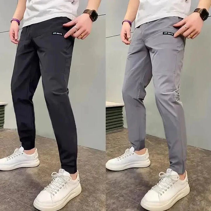 Herenjoggingbroek slim fit stretch taps toelopend licht met zakken