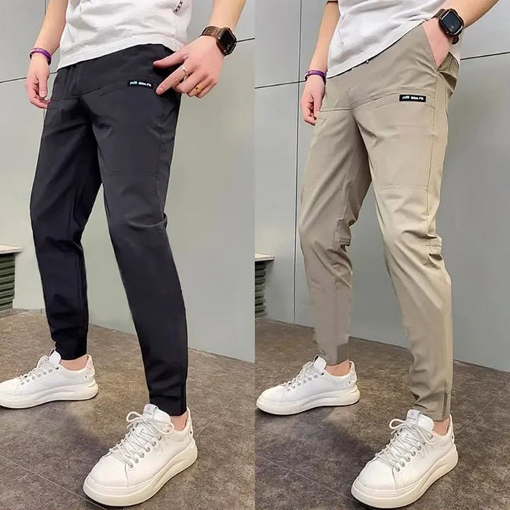 Herenjoggingbroek slim fit stretch taps toelopend licht met zakken