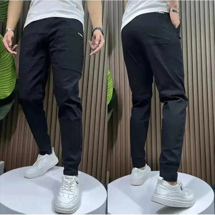 Herenjoggingbroek slim fit stretch taps toelopend licht met zakken