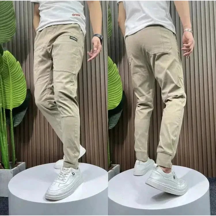 Herenjoggingbroek slim fit stretch taps toelopend licht met zakken