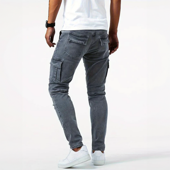 https://cdn.shopify.com/s/files/1/0802/9863/9618/files/mens-slim-fit-cargo-pants-with-side-flap-pockets-05.png?v=1775720741