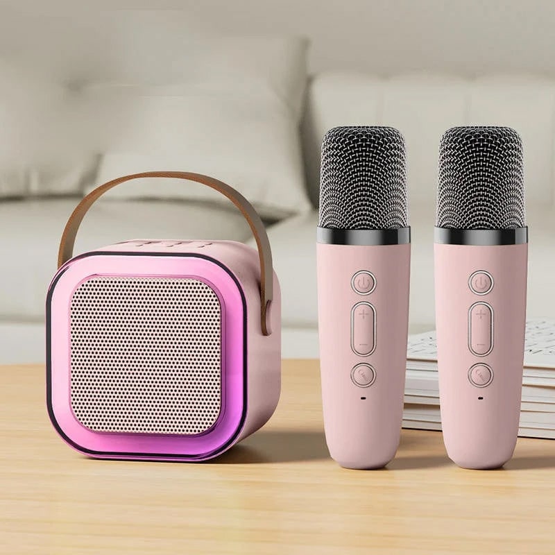 Mini-karaokeset met draadloze microfoons en draagbare bluetooth-speaker