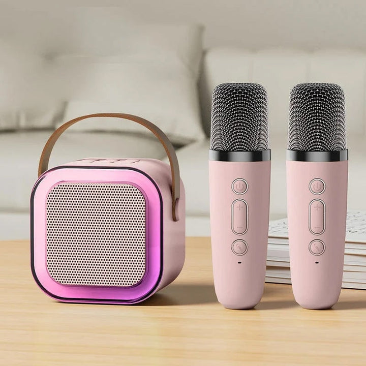 Mini-karaokeset met draadloze microfoons en draagbare bluetooth-speaker