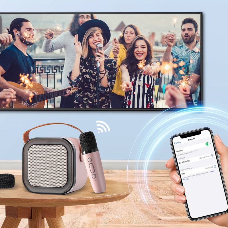 Mini-karaokeset met draadloze microfoons en draagbare bluetooth-speaker