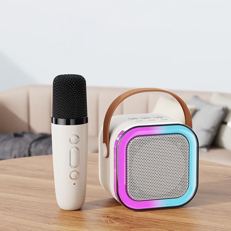 Mini-karaokeset met draadloze microfoons en draagbare bluetooth-speaker