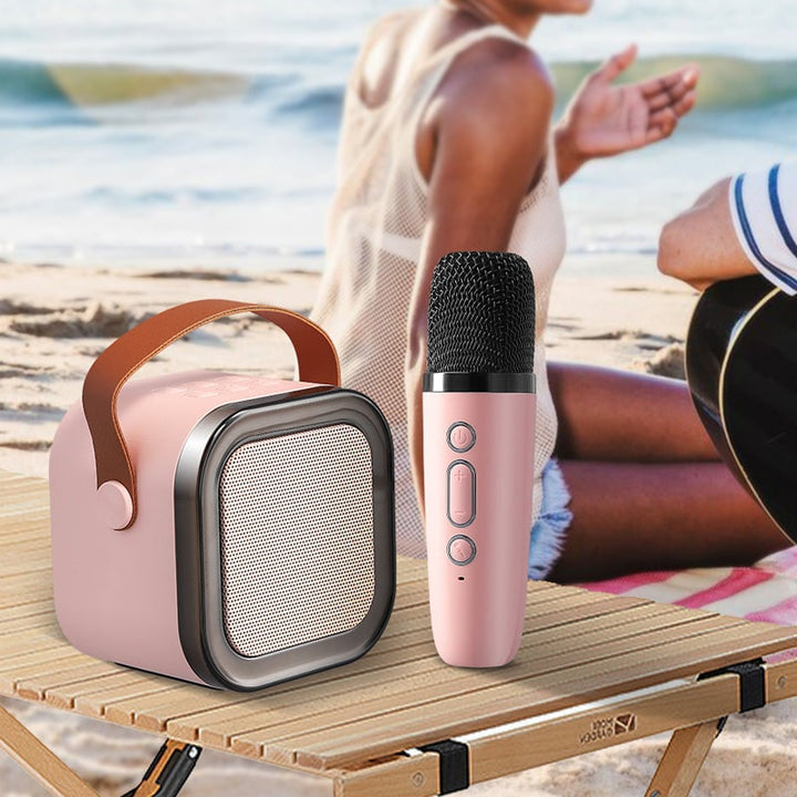 Mini-karaokeset met draadloze microfoons en draagbare bluetooth-speaker