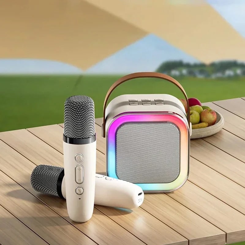 Mini-karaokeset met draadloze microfoons en draagbare bluetooth-speaker
