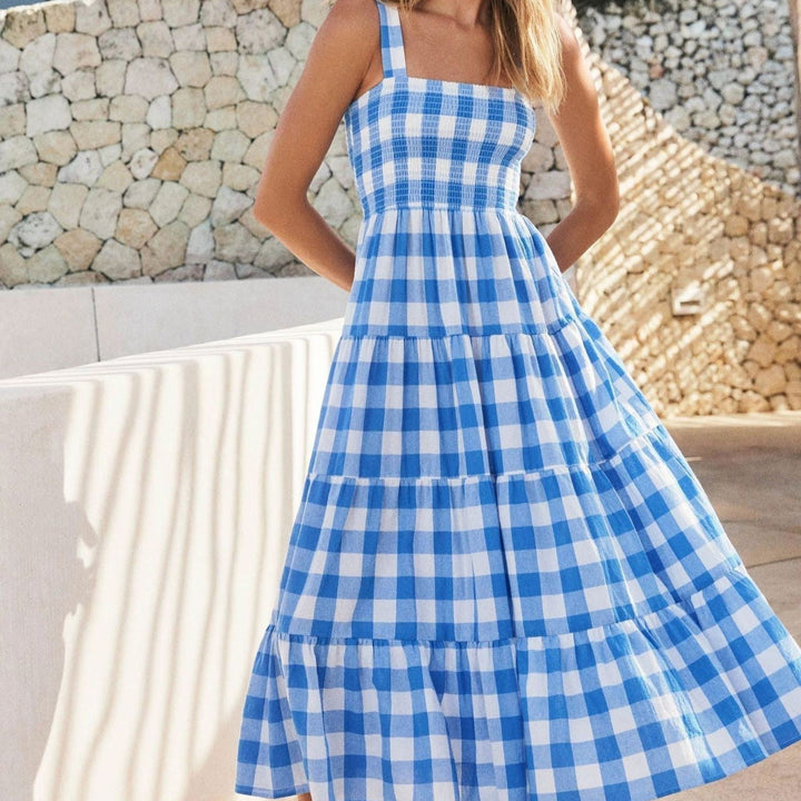 Vloeiende vintage bedrukte spaghettibandjesjurk