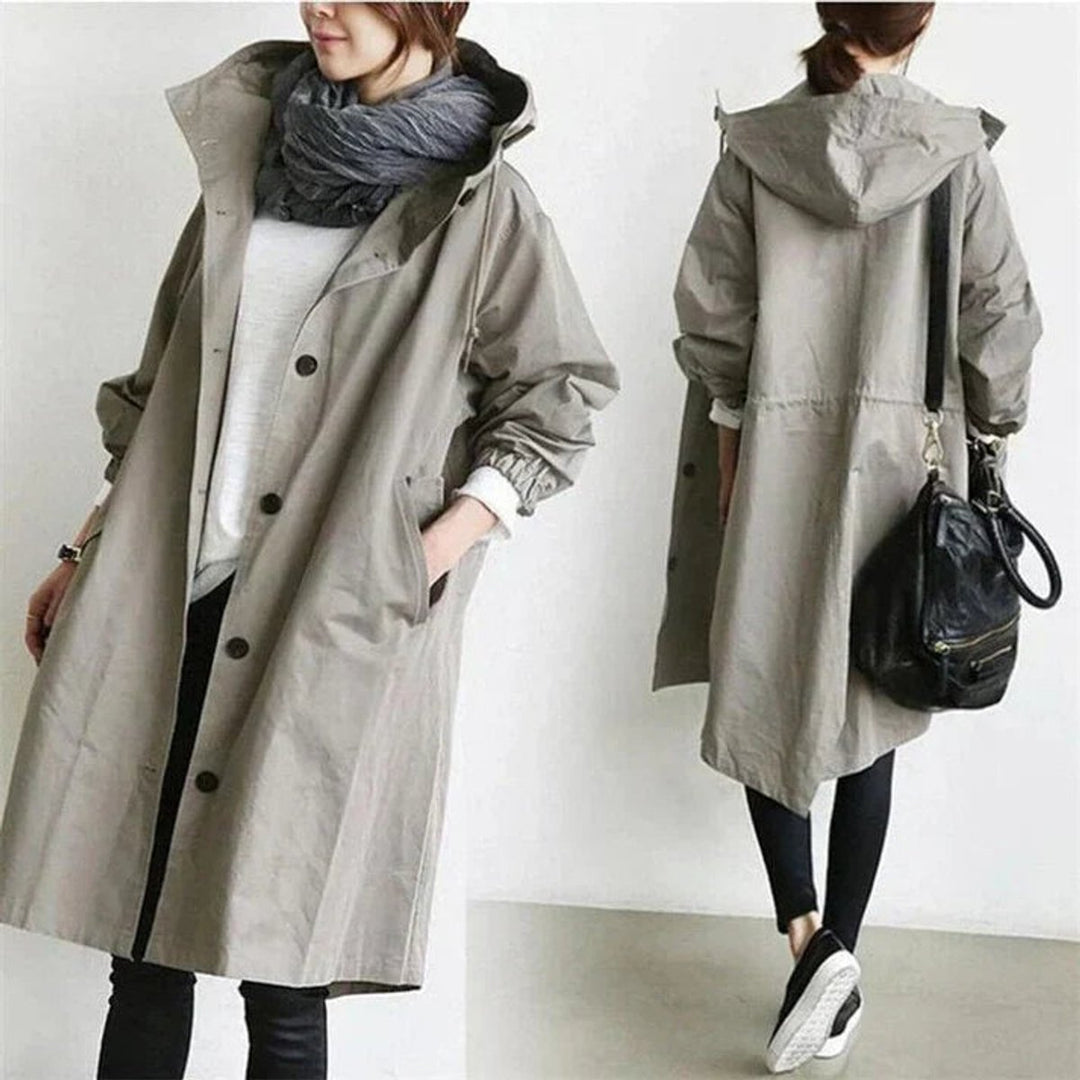 Lange damestrenchcoat met capuchon, waterdicht, oversized pasvorm