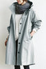 Lange damestrenchcoat met capuchon, waterdicht, oversized pasvorm