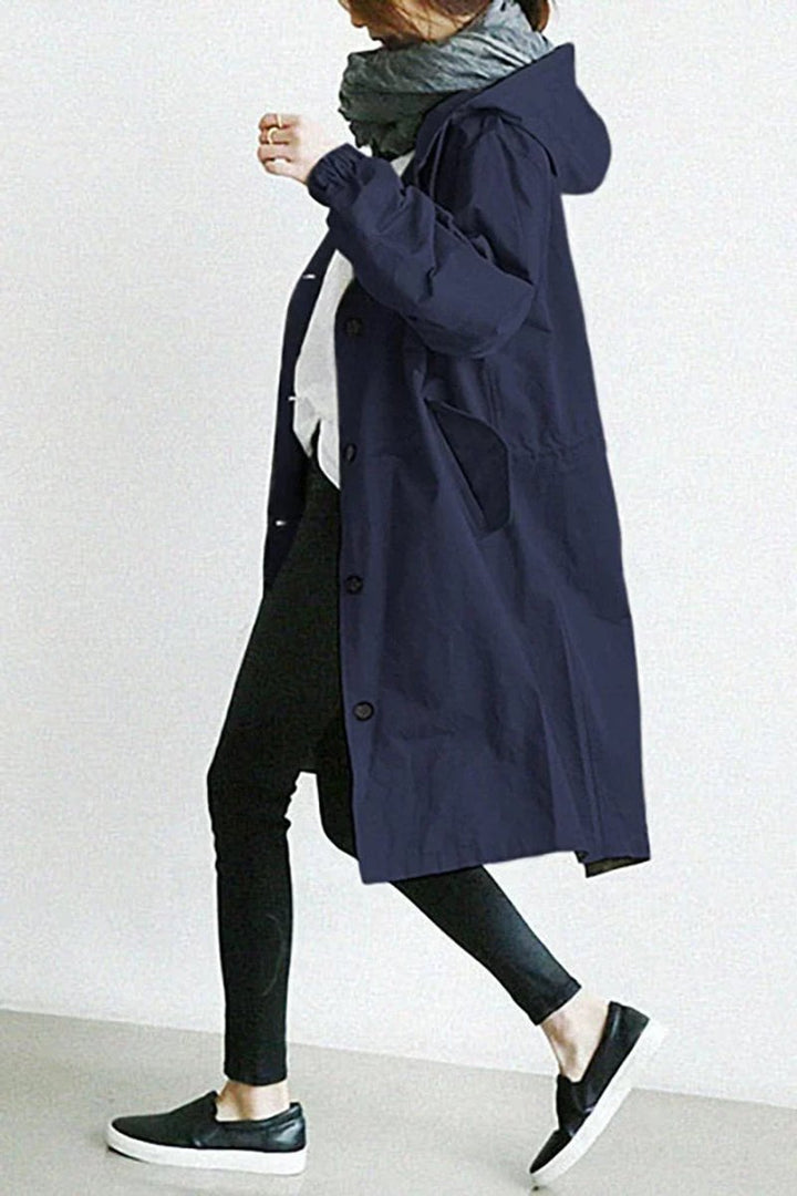 Lange damestrenchcoat met capuchon, waterdicht, oversized pasvorm