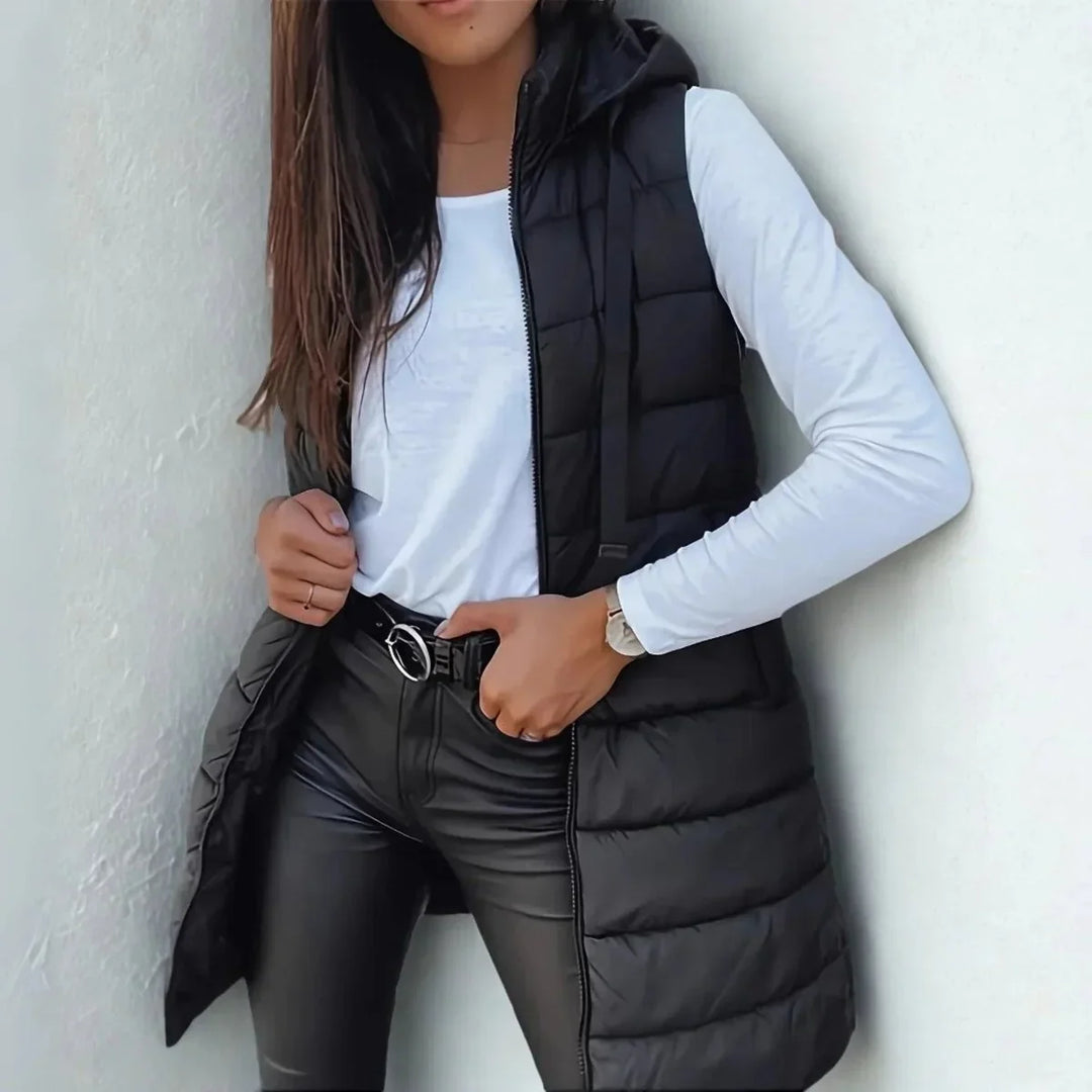 Lange mouwloze puffer gilet met capuchon