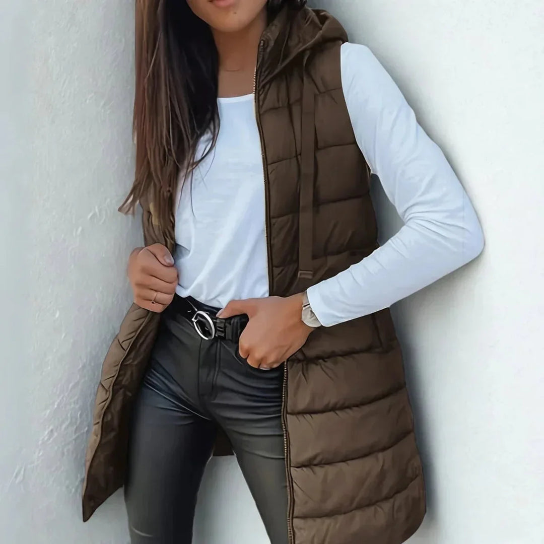 Lange mouwloze puffer gilet met capuchon