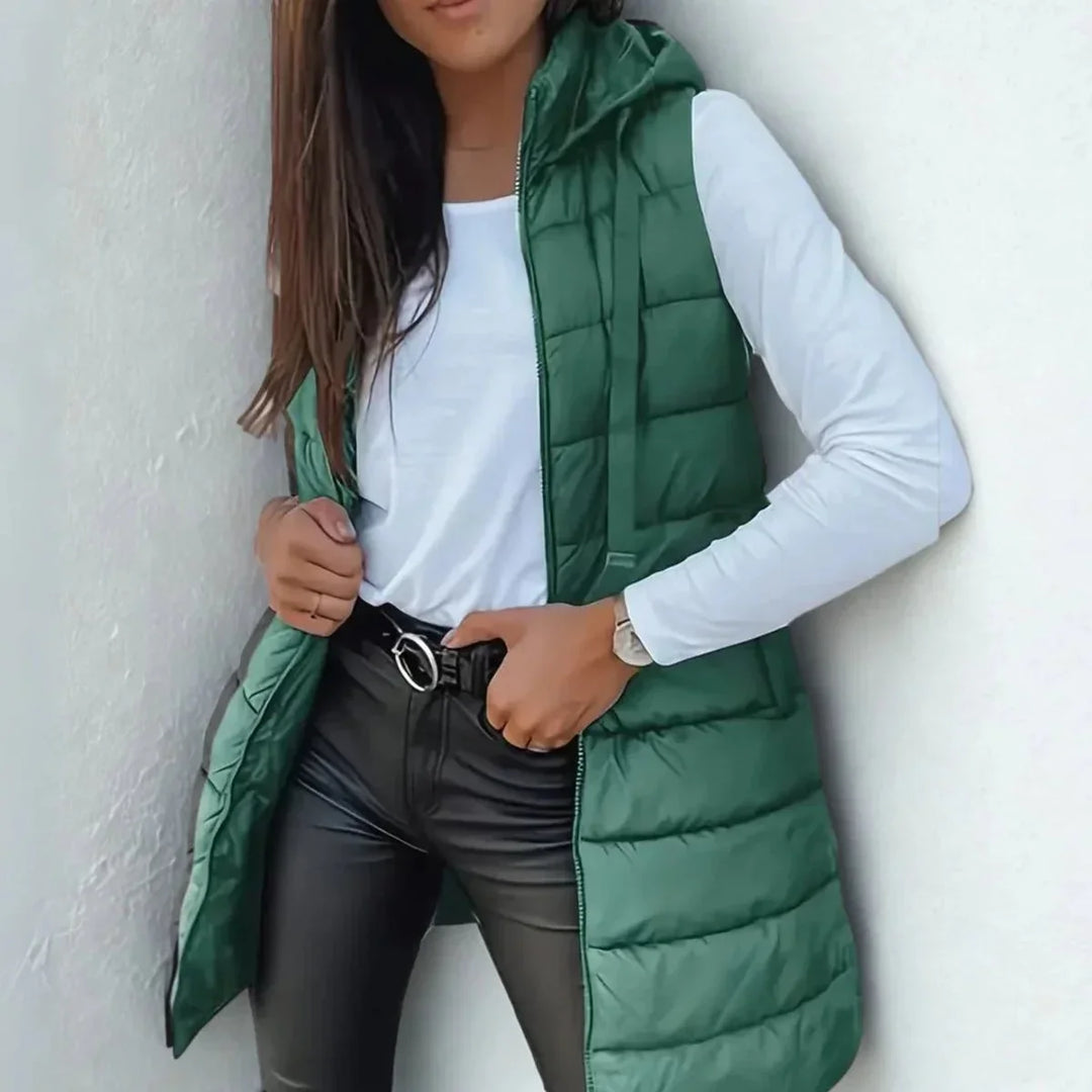 Lange mouwloze puffer gilet met capuchon