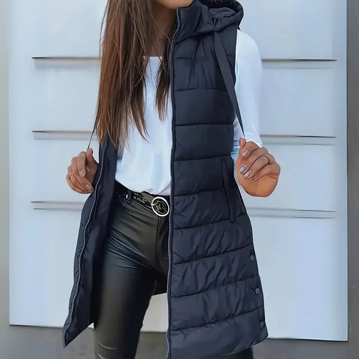 Lange mouwloze puffer gilet met capuchon