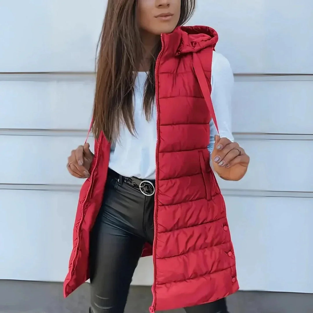 Lange mouwloze puffer gilet met capuchon