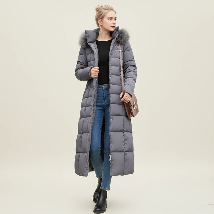 Lange dames puffer jas met capuchon van imitatiebont, gewatteerd en met riem, winterjas