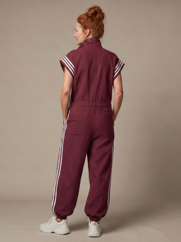 Jumpsuit met gestreepte panelen, rits voorop en korte mouwen voor dames